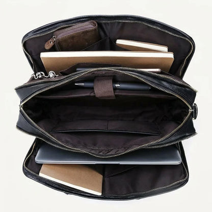 Men's Smooth Black Leather Laptop Briefcase — open from above with laptop, notebooks and wallet inside