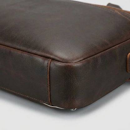 Men’s Leather Computer Briefcase — close-up of leather surface and base edge