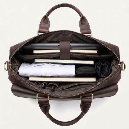 Men's Full-Grain Leather Flap-Over Briefcase — open from above with a shirt, notebooks and a laptop inside