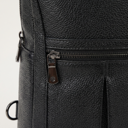 Men's Full-Grain Leather Sling Chest Bag — close-up of the front pocket and stitching