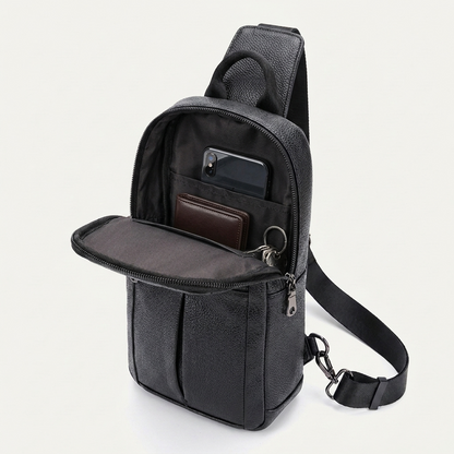 Men's Full-Grain Leather Sling Chest Bag — open with a phone, card holder and keys inside