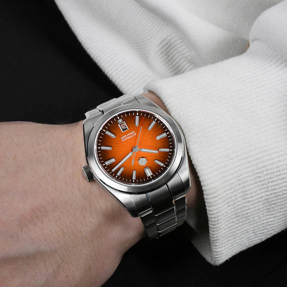 San Martin SN0144 Horizon orange dial automatic watch worn on wrist, showcasing elegant stainless steel construction and precise craftsmanship.