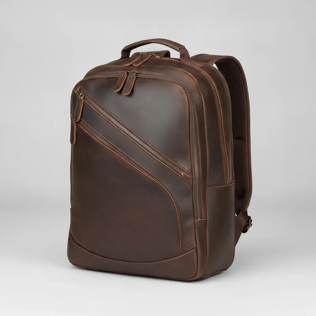 Leather Multi-Pocket Travel Backpack — three-quarter front view on a light grey background