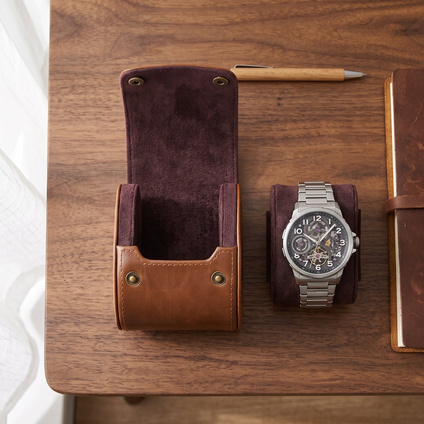 watch box and watch on wooden desk